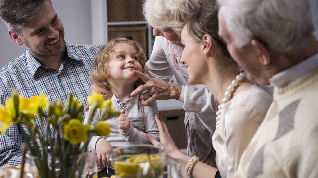 Multi-generation family having dinner together.