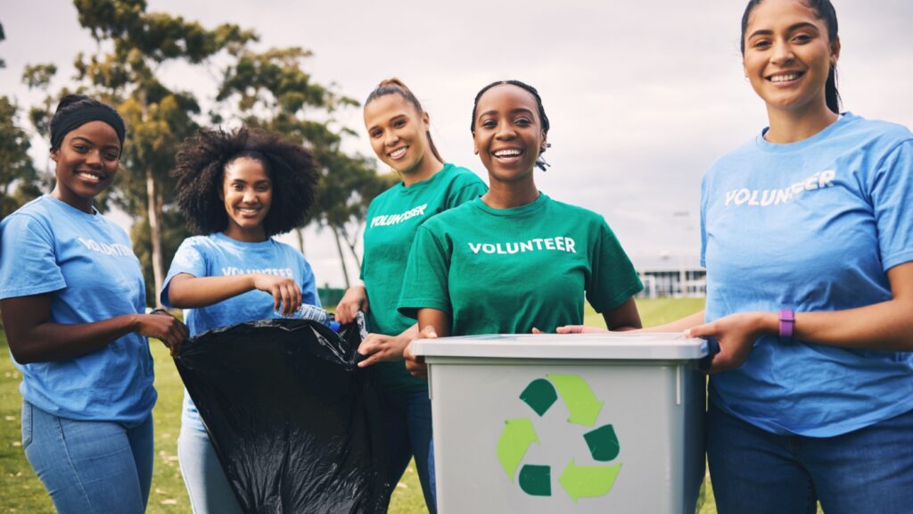 A group of women volunteering outside.