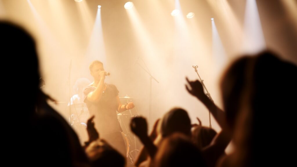 A band on stage at a gig.