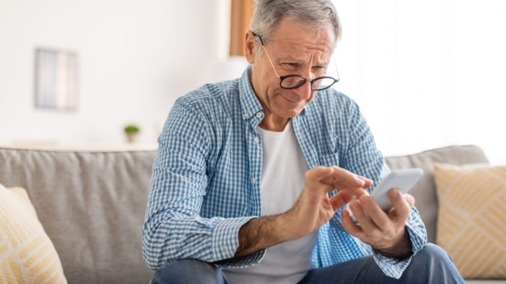 A man using his phone.