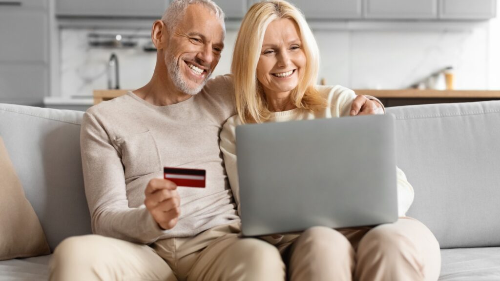 Happy couple shopping online