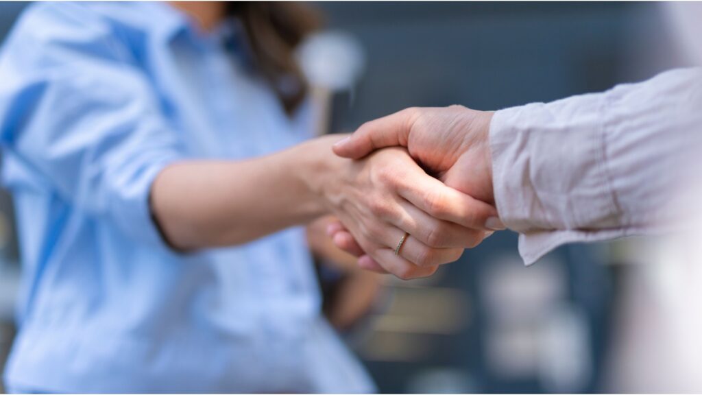 Two people shaking hands