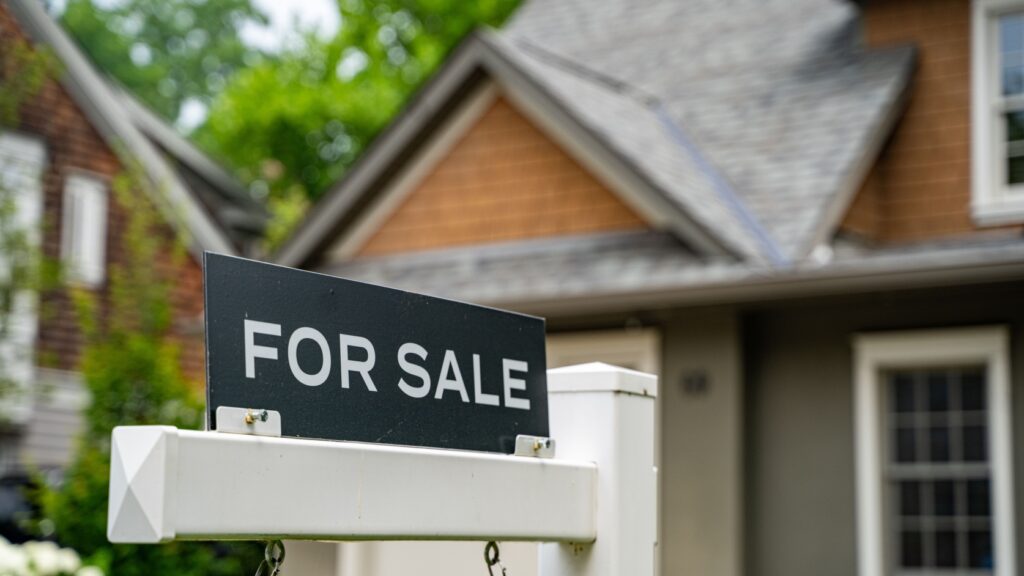 A “for sale” sign outside a property.